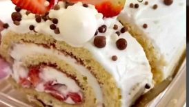 Vanilla Swiss Roll Cake with Strawberries and Whipped Cream