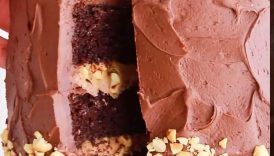 This Snickers cake with nougat + peanut caramel filling is my fave flavor thus far! #cake #snickers