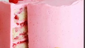 The dreamiest layers going on in this lemon raspberry cake 😍 recipe at sugarandsparrow #cake